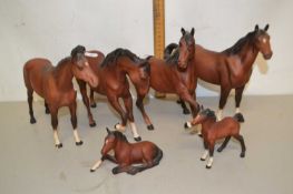 A quantity of ceramic horse models and foals, mainly by Beswick