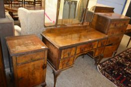 A 1920's bedroom set, dressing table and mirror, chest of drawers and further side cabinet