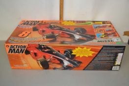 A boxed electronic Action Man Mission Grand Prix racecar