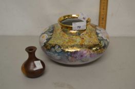 Pottery bowl with floral and gilt design together with a further turned small wooden vase