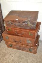 Collection of four vintage suitcases