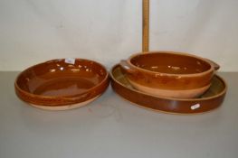 Group of three brown glazed French pottery dishes