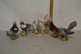 Quantity of ceramic bird models mainly by Beswick including pigeons and others