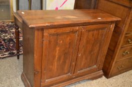 A two drawer cabinet, distressed