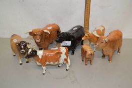 Group of figures of bulls and cows, mainly by Beswick including Ickham Bessie and Guernsey Cow