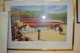 A framed print of Trooping the Colour signed in the mount by Terence Cuneo