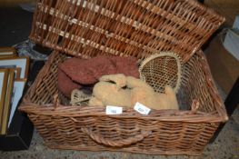 A wicker box containing a small model of a rabbit