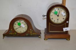 Two clocks, one with applied Chinoiserie style decoration the other with domed wooden case, the dial