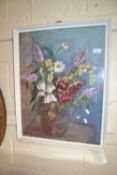 A framed still life watercolour of flowers