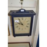 A mantel clock in wooden frame by Little Snoring Clockworks, Norfolk