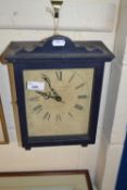 A mantel clock in wooden frame by Little Snoring Clockworks, Norfolk