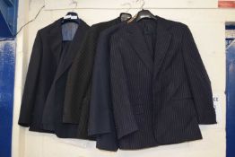 Group of four gentleman's pinstripe and plain suits