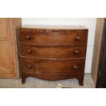 A small late Georgian mahogany bow front three drawer chest, 88cm wide