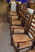 Set of six ladder back and rush seat dining chairs
