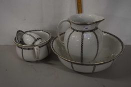 A Wilkinson Ltd early 20th Century black and white wash bowl, jug set