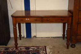 Victorian mahogany two drawer side table on turned legs, 122cm wide