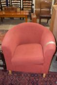 Red upholstered tub chair