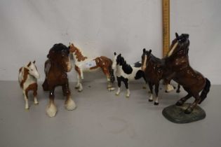 A Beswick shire horse together with others similar