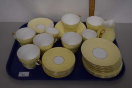 A quantity of Wedgwood yellow and gilt decorated tea wares