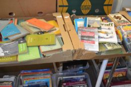 Four boxes of various mixed books to include paperbacks and others