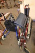 Two folding mobility walkers