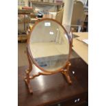 A dressing table mirror