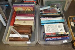 Two plastic boxes of mixed books