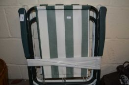 A pair of folding garden chairs