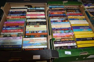 Two boxes of various paperback books