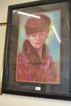 20th century portrait of a lady wearing a Ushanka and fur coat, oil on board,13x21ins, framed and