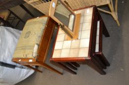 A nest of three tables, a piano stool and a dressing table mirror