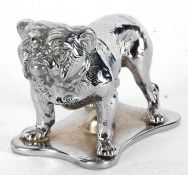 A vintage chrome bulldog paperweight modelled as a standing dog on an integral shaped base, 10 x 4