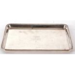 George V silver dressing table tray of rectangular form, applied reeded edge, the centre engraved