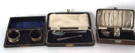 Mixed Lot: A cased George VI silver christening spoon and serviette ring, Birmingham 1941, makers