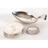 Mixed Lot: A George V silver caddy spoon with a lozenge shaped bowl and small heart shaped handle,