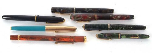 A group of seven various vintage fountain pens to include Onoto de la Rue, London, a mottled