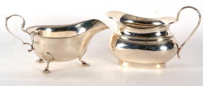 Mixed Lot: A George V silver sauce boat of plain helmet shaped form, Sheffield 1933, makers mark