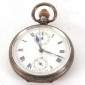 A silver chronograph pocket watch hallmarked on the inside of the case back and the dust cover, it