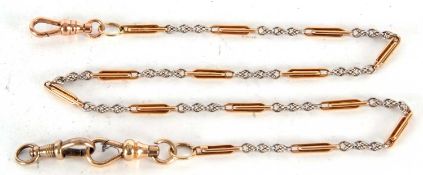 A vintage yellow metal watch chain comprising of fourteen trombone links joined by a white metal