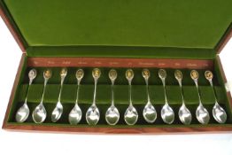 A cased set of "The Royal Horticultural Society" silver flower spoons (12), silver spoons made by