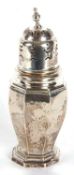 An Art Deco silver caster of plain octagonal form with pull off pierced lid having an urn shaped
