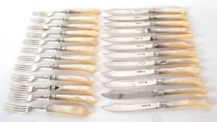 Twelve pairs of silver bladed and mother of pearl handled fish eaters, London 1912, makers mark