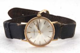 A 9ct gold cased Garrard gents wristwatch, stamped inside the case back 375, it has a crown wound
