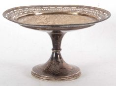 A George V silver tazza with pierced geometric designed border, beaded rim detail and foot,