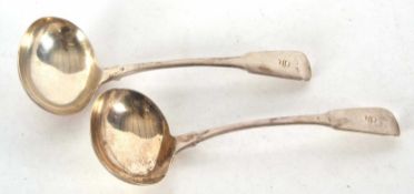 Pair of George III silver fiddle pattern ladles, initialled, having oval shaped bowls and hallmarked