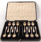 A cased set of twelve silver teaspoons, Sheffield 1936, makers mark James Dixon & Sons Ltd