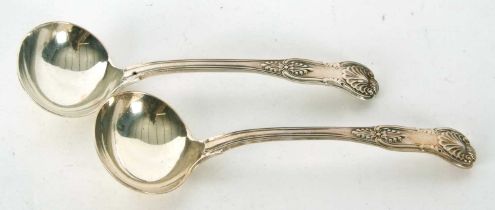 A pair of William IV Kings pattern ladles having shaped oval bowls, hallmarked for London 1837,