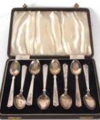 A cased set of eight George VI silver teaspoons having reeded decorated handles, hallmarked for