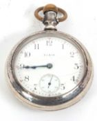 A white metal Elgin pocket watch stamped inside the case back "FAHYS Coin", it has a crown wound