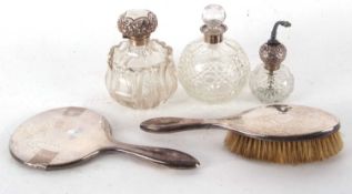 Mixed Lot: An Edwardian glass scent bottle of globular form, the body with moulded leaf design and
